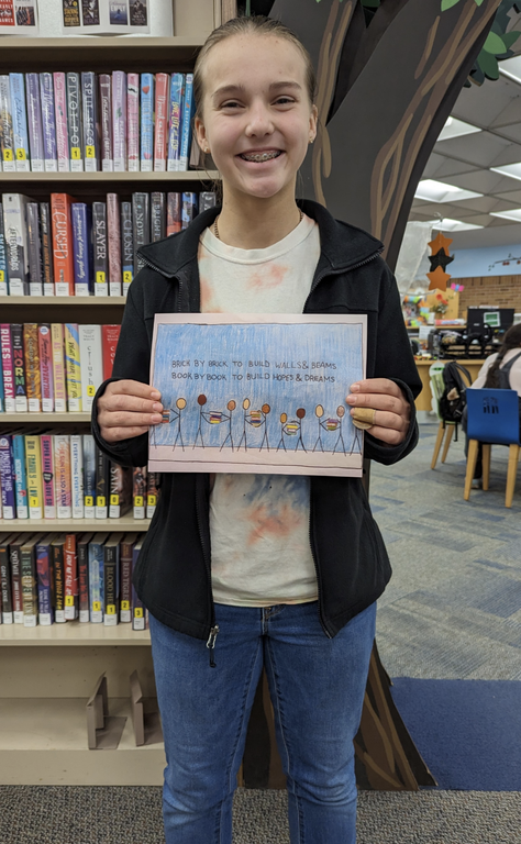 Winner Eillie of the library card design contest